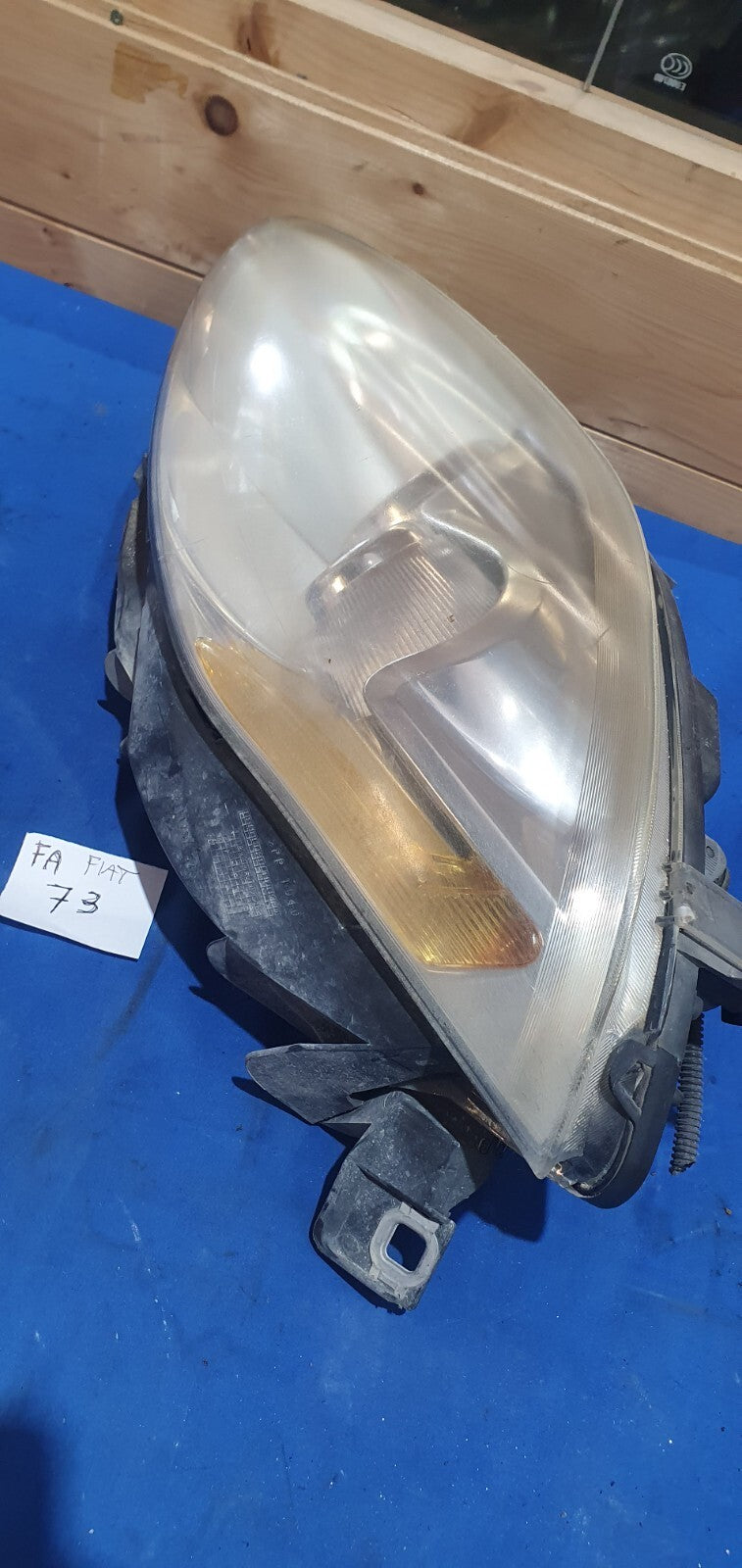 FA 73 - Faro anteriore Fiat Bravo sinistro 51757538 con attacco rotto e bucato