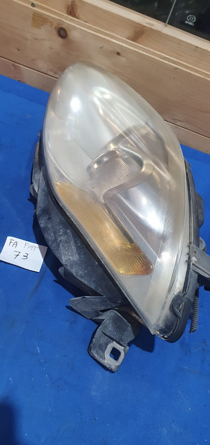 FA 73 - Faro anteriore Fiat Bravo sinistro 51757538 con attacco rotto e bucato