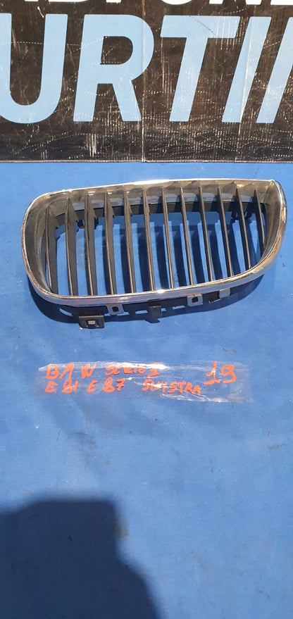 Masc 19 - Mascherina griglia anteriore Bmw serie 1 E81 E87 sinistra