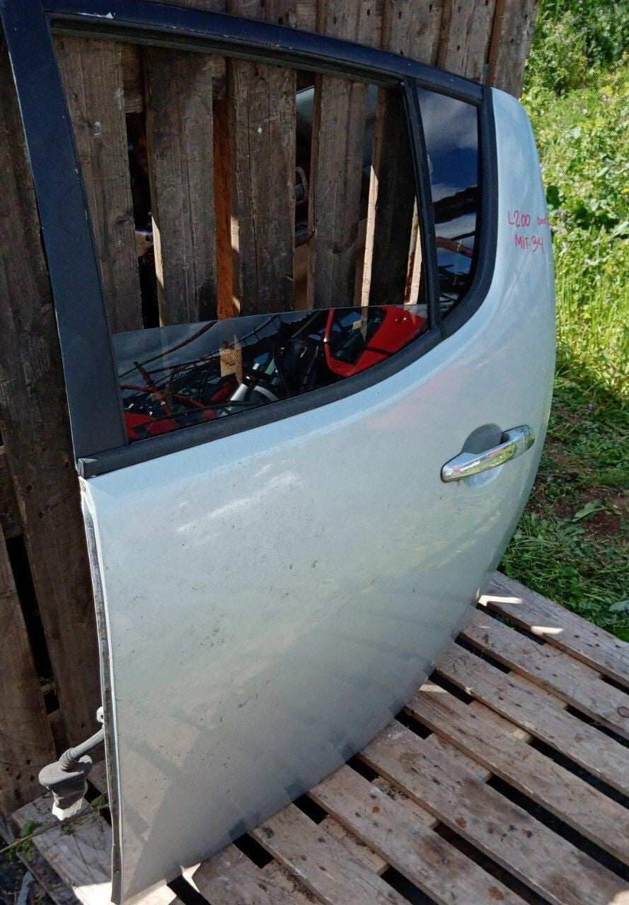 Portiera sportello posteriore sinistro Mitsubishi L200 2005 in poi Cod. Mit34