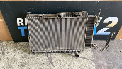 Radiatore Acqua e radiatore AC Ford Fiesta 1.2Bz Anno 2009 Numero oggetto R5109